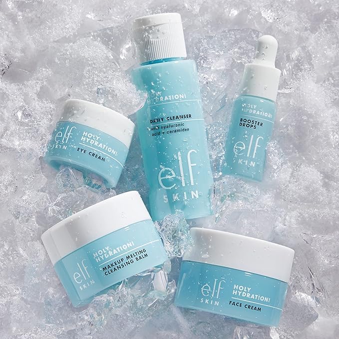 e.l.f. SKIN Holy Hydration mini set products laid on ice - Eye Cream, Cleansing Balm, Daily Cleanser, Booster Drops, Face Cream